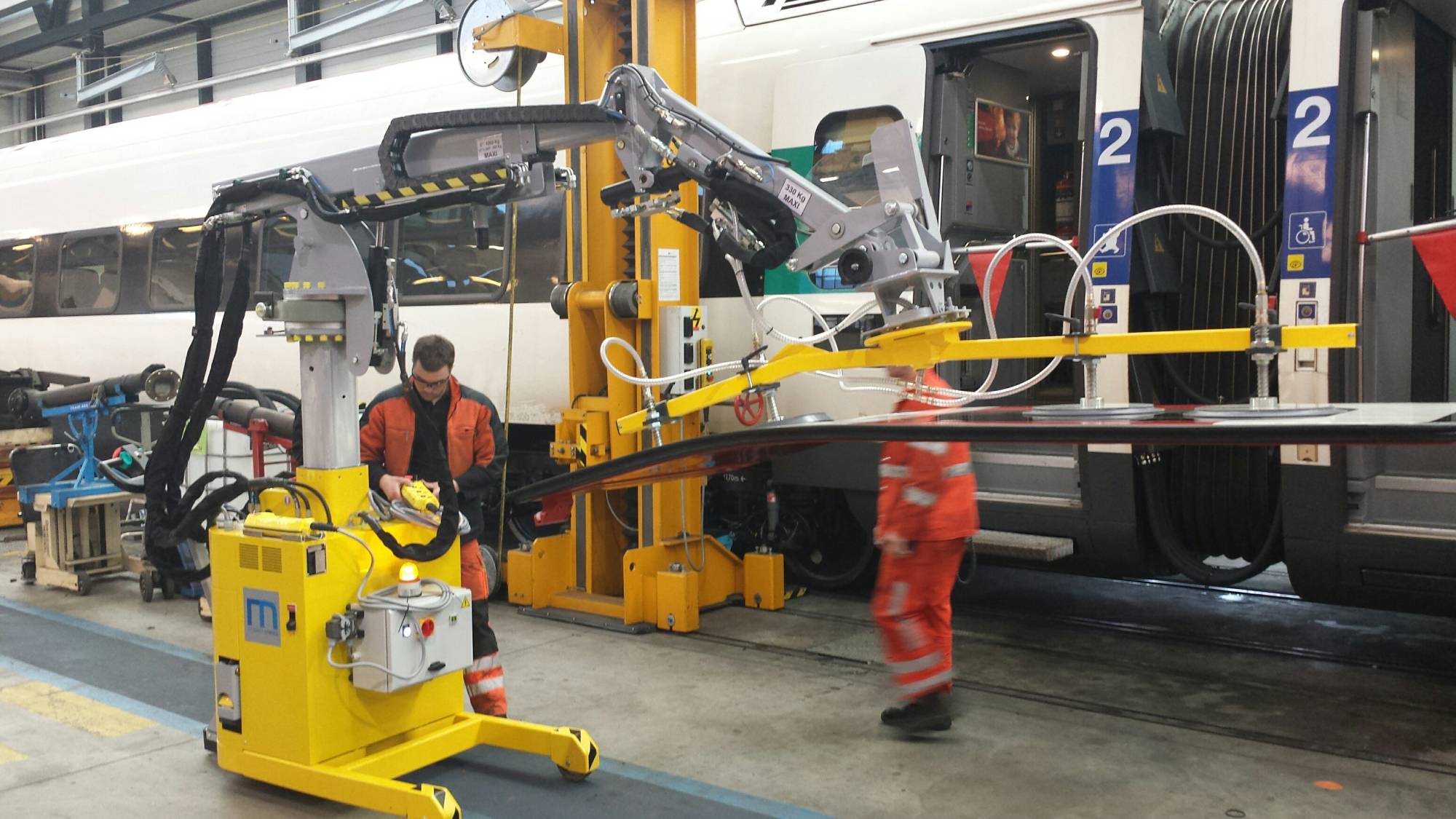 kran mit Vakuumhebegerät für die Eisenbahnwartung